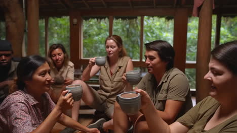 group of people drinking tea