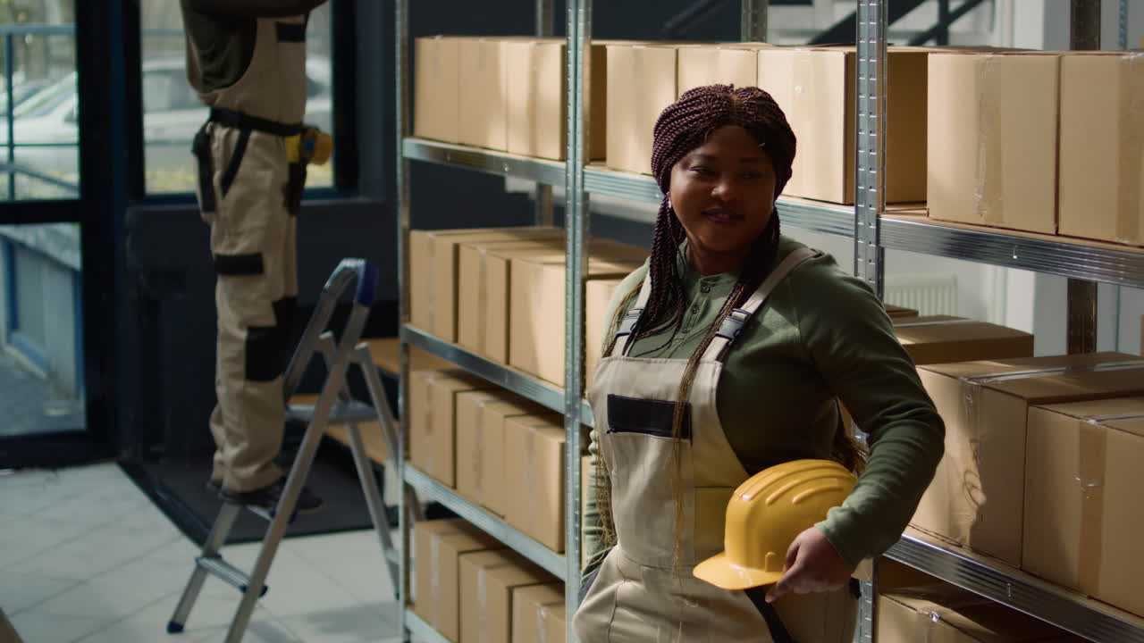 Warehouse workers with boxes and shelves