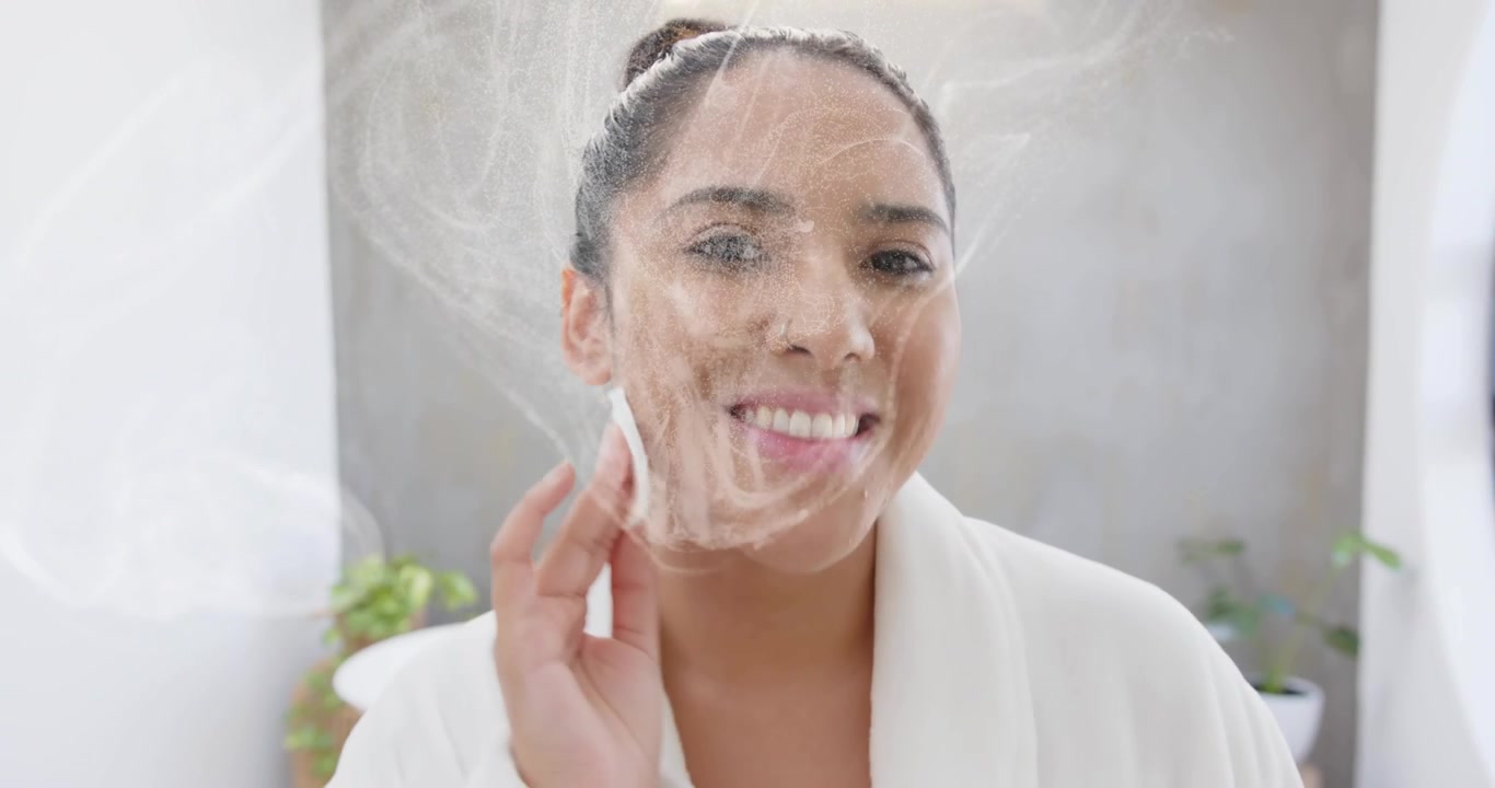 Woman applying cleansing foam with cotton pad and initiating animated swirl for skincare routine