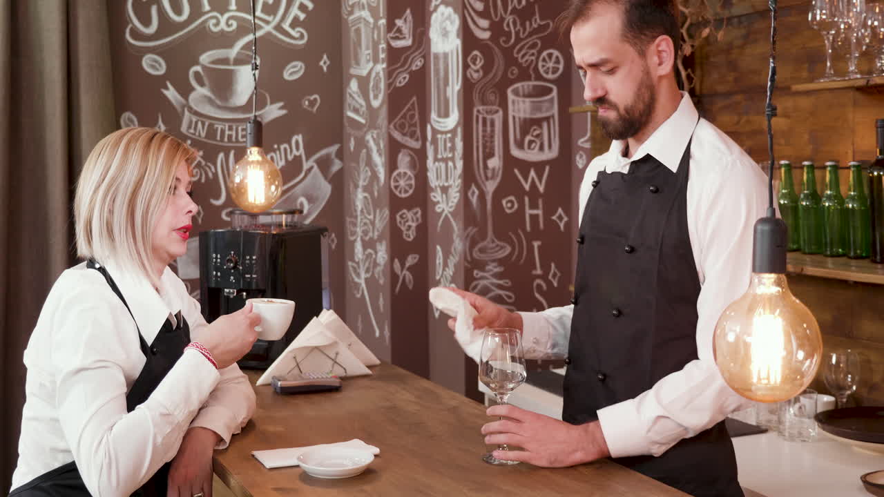 Barista serving a customer at a coffee shop