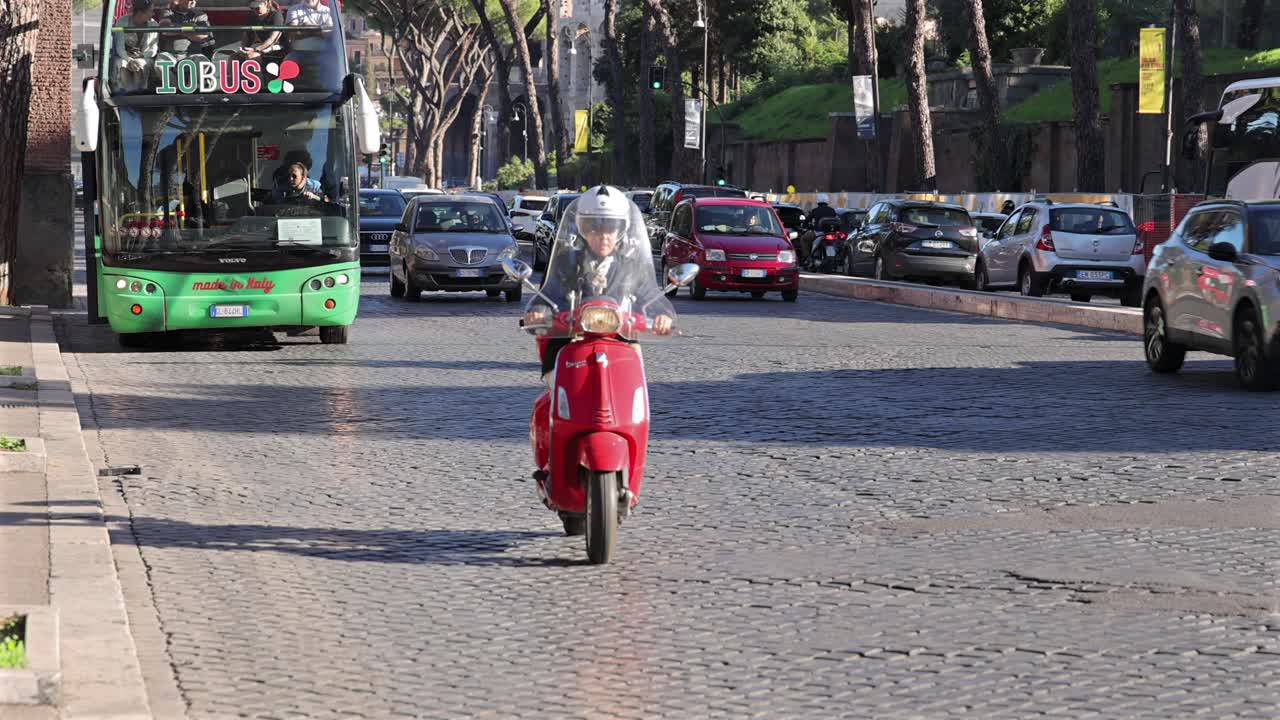 Rome, Italy Traffic in Slow Motion Mopeds and Vehicles on City Streets