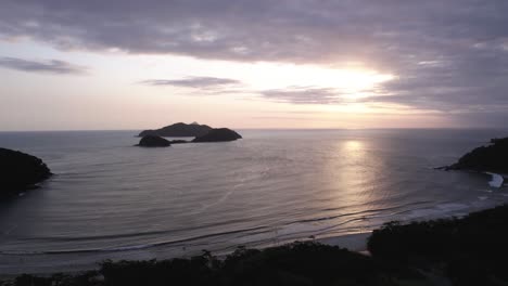 aerial overview of the barra do sahy beach and the seascape, sunset in sao sebastiao, brazil