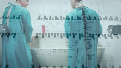animating medical data charts over surgeons operating in hospital room