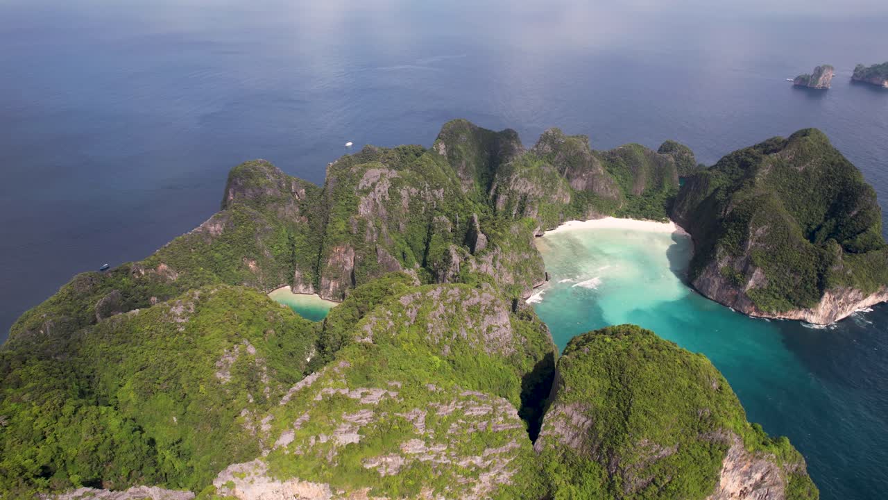 Aerial top-down drone view of Phi Phi Leh, Pileh Lagoon, Krabi province, Thailand. Amazing tropical island with turquoise water and white beach, famous travel destination, clear turquoise water.