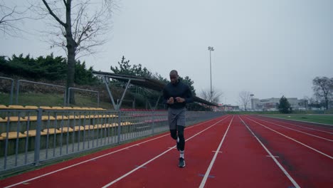 man running on a track
