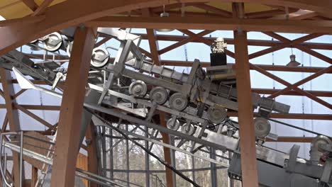 metal funicular mechanism with rotating wheels. lifting elevator to the mountain