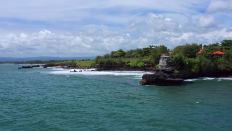 seascape surrounding tanah lot temple in bali, indonesia - aerial shot
