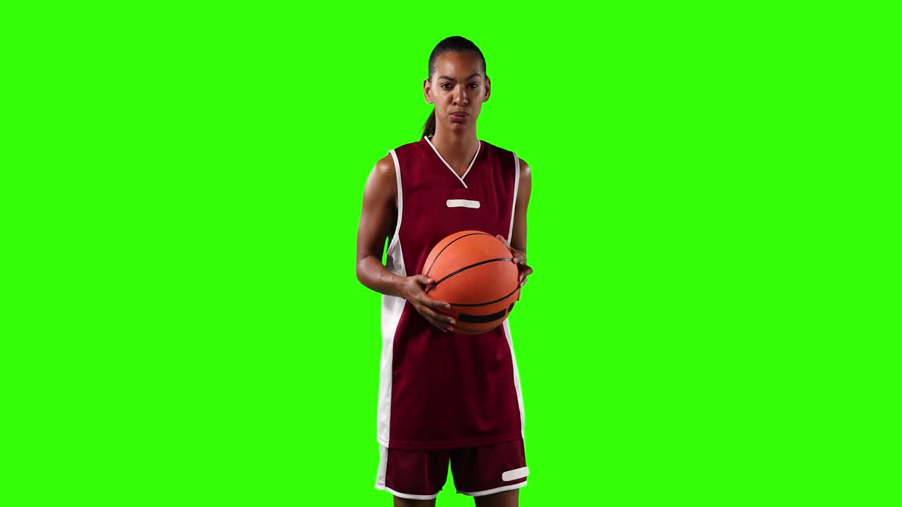 Female basketball player on green screen