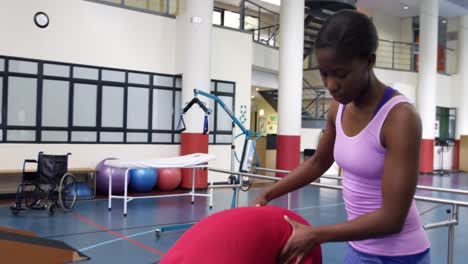 man exercising with prosthetic legs