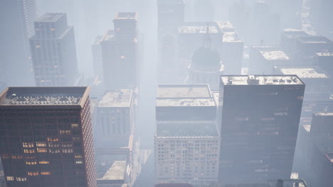 skyscrapers covered by morning fog