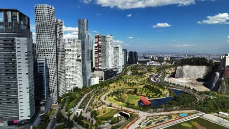tall apartments and the la mexicana in sunny santa fe, mexico city - aerial view