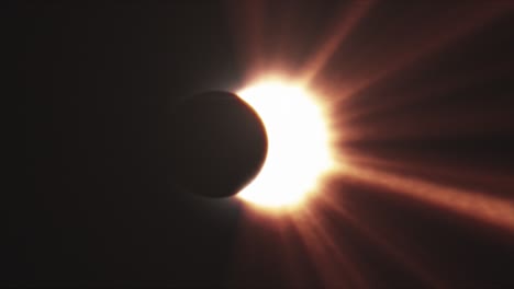 Sun rays of light, moon covering the sun during Total Solar Eclipse