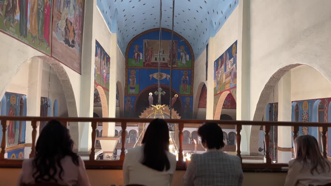 Greek orthodox church during mass, beautiful decorated interior during Easter