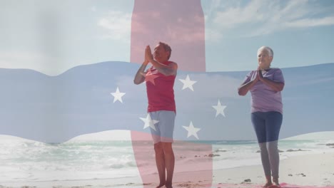 Animación-De-La-Bandera-De-Las-Antillas-Holandesas-Sobre-Una-Feliz-Pareja-Birracial-Meditando-En-La-Playa