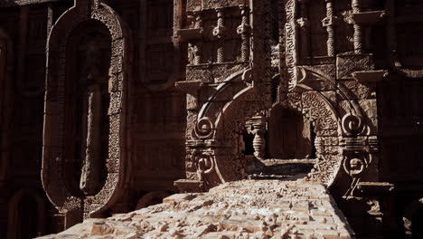 ancient stone ruins with archway and stone bridge