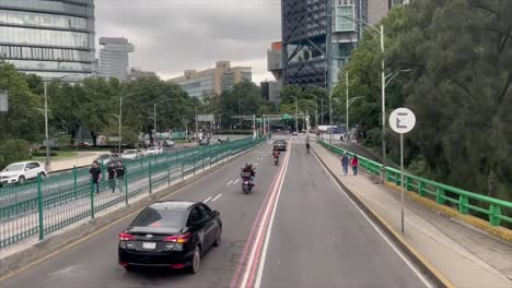 slow motion shot in mexico city at the entrance of chapultepec and finance district at morning