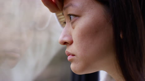 Close-Up-Of-Stressed-Or-Anxious-Woman-Suffering-With-Depression-Anxiety-Loneliness-Or-Agoraphobia-Leaning-Against-Window-At-Home-6