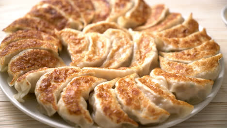 fried gyoza or dumplings snack with soy sauce in japanese style