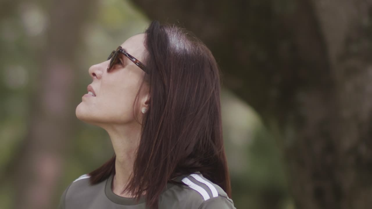 Sophisticated pretty female, stylish vision frames, camera phone