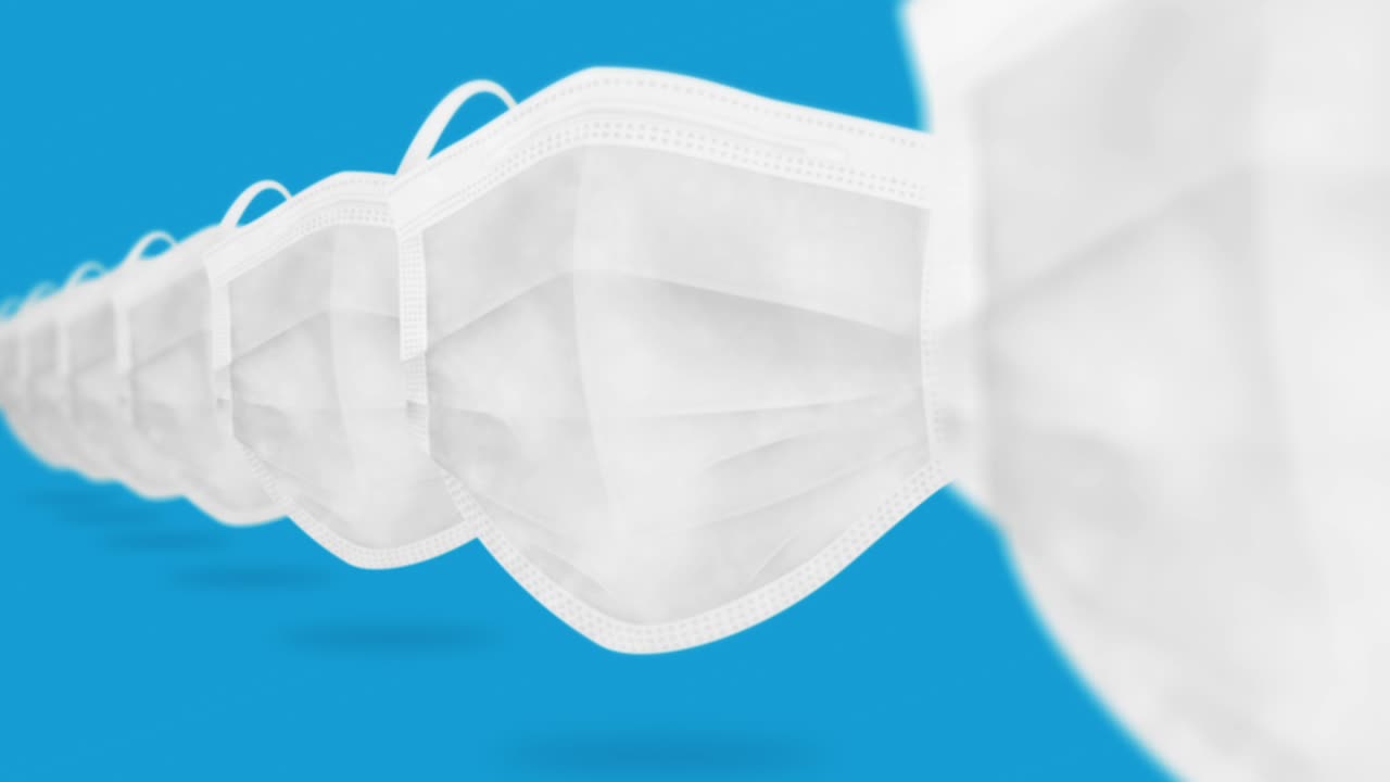 바이러스로부터 보호하기 위해 입과 코를 는 많은 의료 마스크. 건강 관리 개념. 3d 현실적인 의료 마스크, 루프 애니메이션.