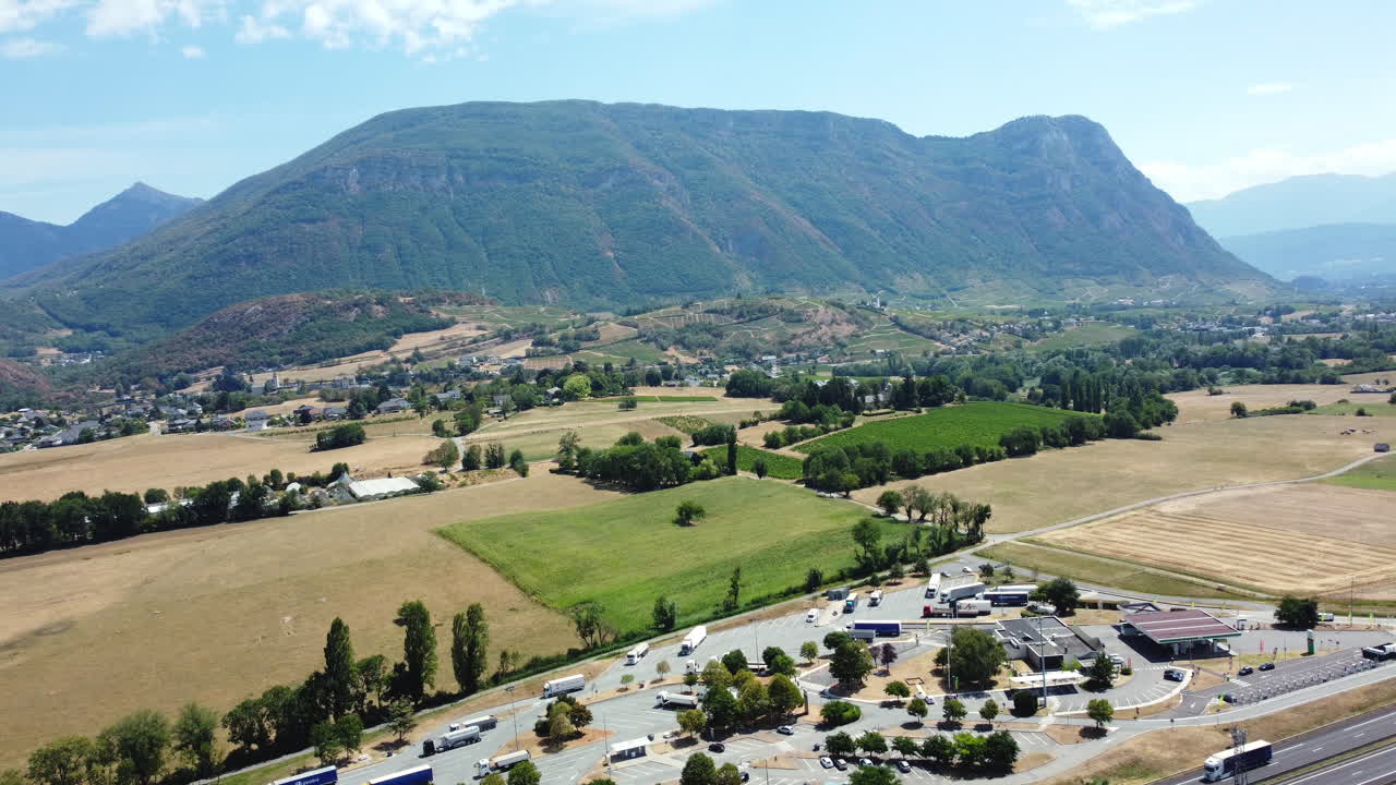 Aerial View of Mountainous French Valley and Truck Stop