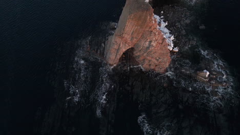 cinematic drone shot of famous perce rock in quebec, canada