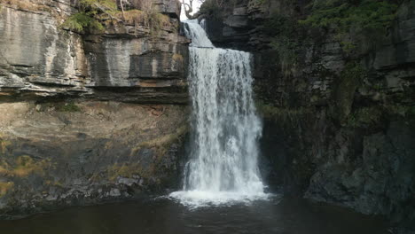 waterfall slow motion pull away from close up at ingleton waterfalls trail yorkshire uk