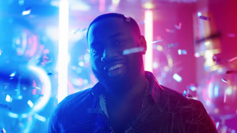 African-american-man-making-hand-gesture-at-party.-Afro-guy-standing-in-club