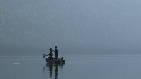 two fishermen fishing in the river 4k