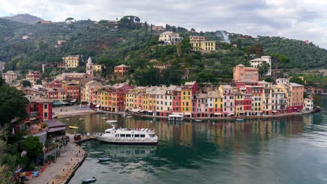 tourists boarding on cruise yacht in harbor of portofino, timelapse