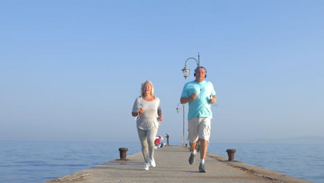 people jogging with smart watch