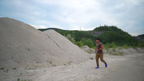 man running in a quarry