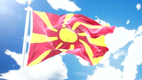 realistic flag of macedonia waving against time-lapse clouds background. seamless loop in 4k resolution with detailed fabric texture.