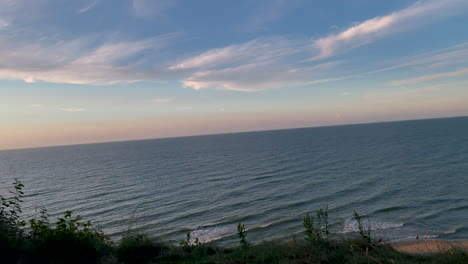 sunset over the beautiful blue coastal waters of jastrzębia góra, poland -pan