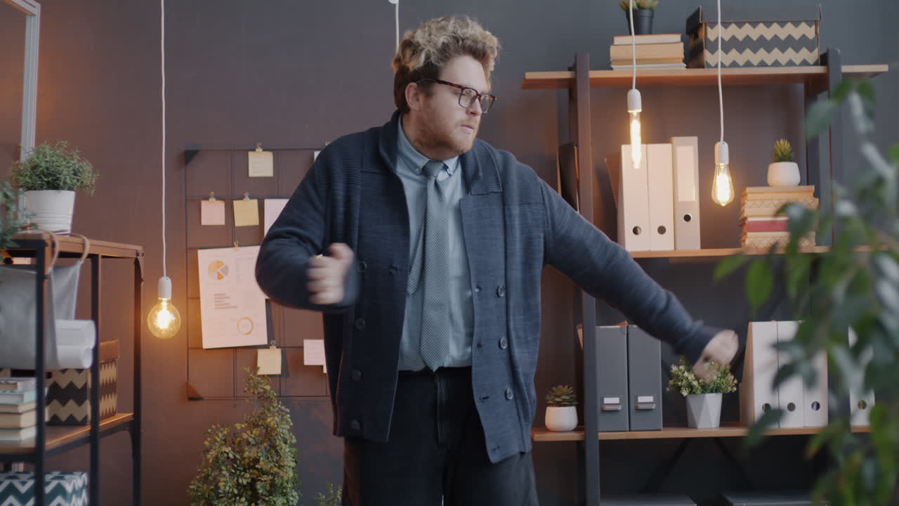 Man Dancing in Office