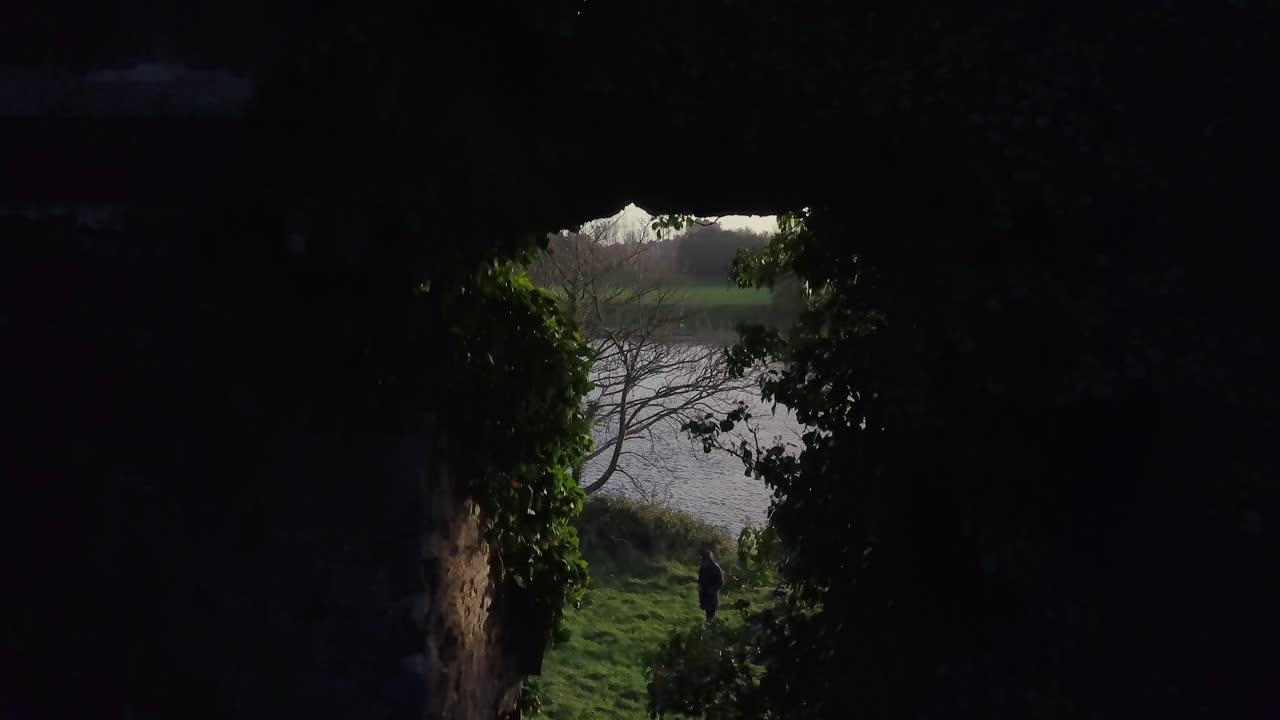 Ascending shot through windows of interior Menlo Castle, Galway