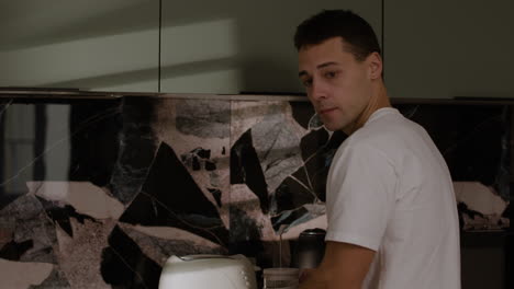 couple enjoying coffee in kitchen