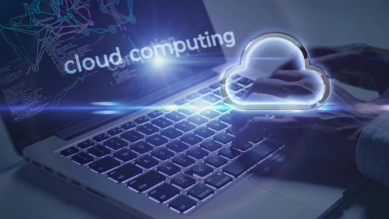 Hands Typing on Laptop Keyboard with Cloud Computing Concept