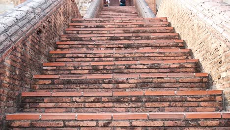 ascending brick steps of historic pagoda in ayutthaya