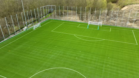 aerial view of empty green soccer field in poland