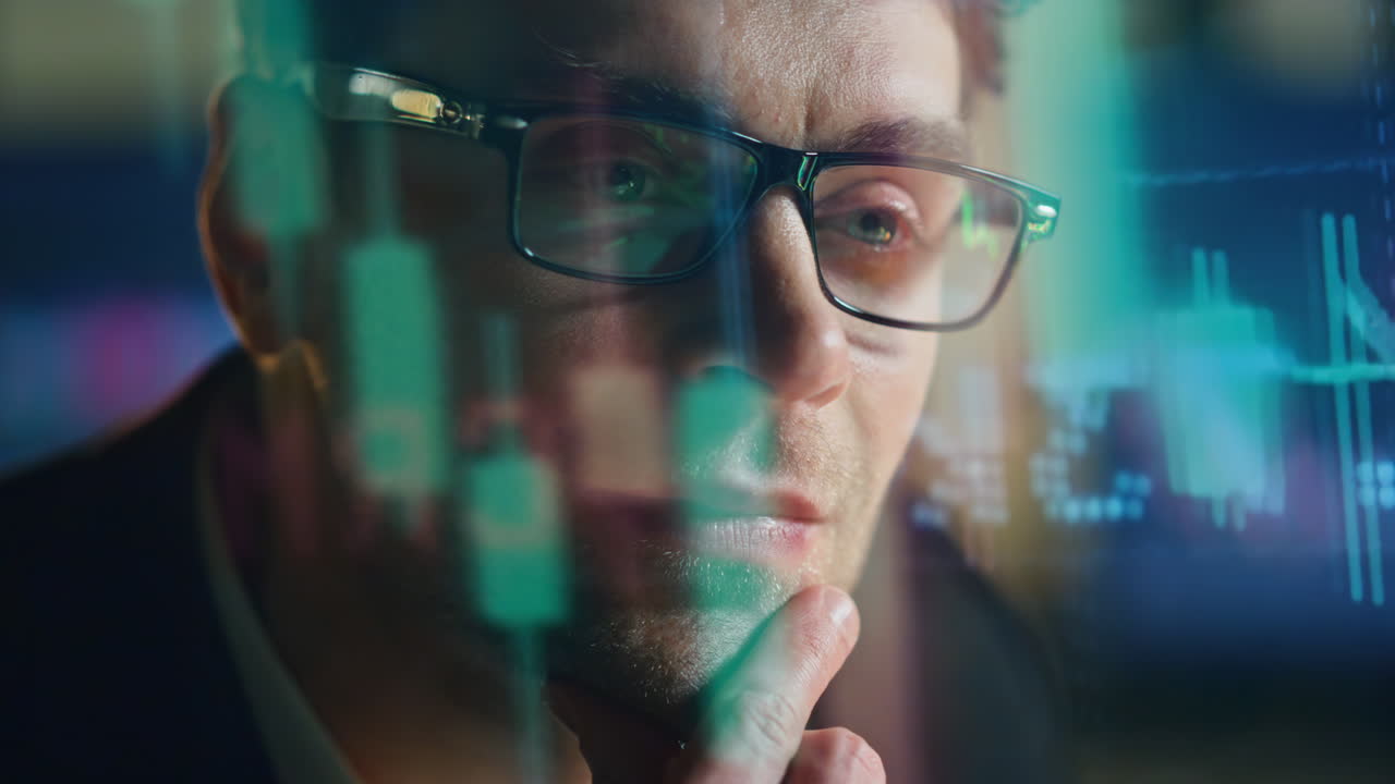 Closeup stock market analyst with economic holographic data. Smiling man trader