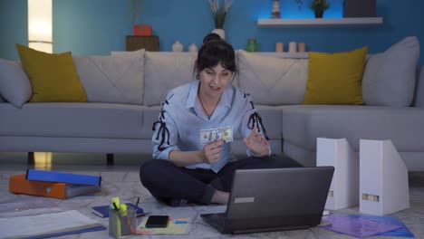 home office worker woman trading dollars.