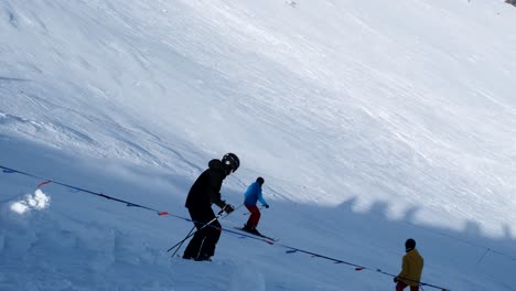 skiers on a snowy slope