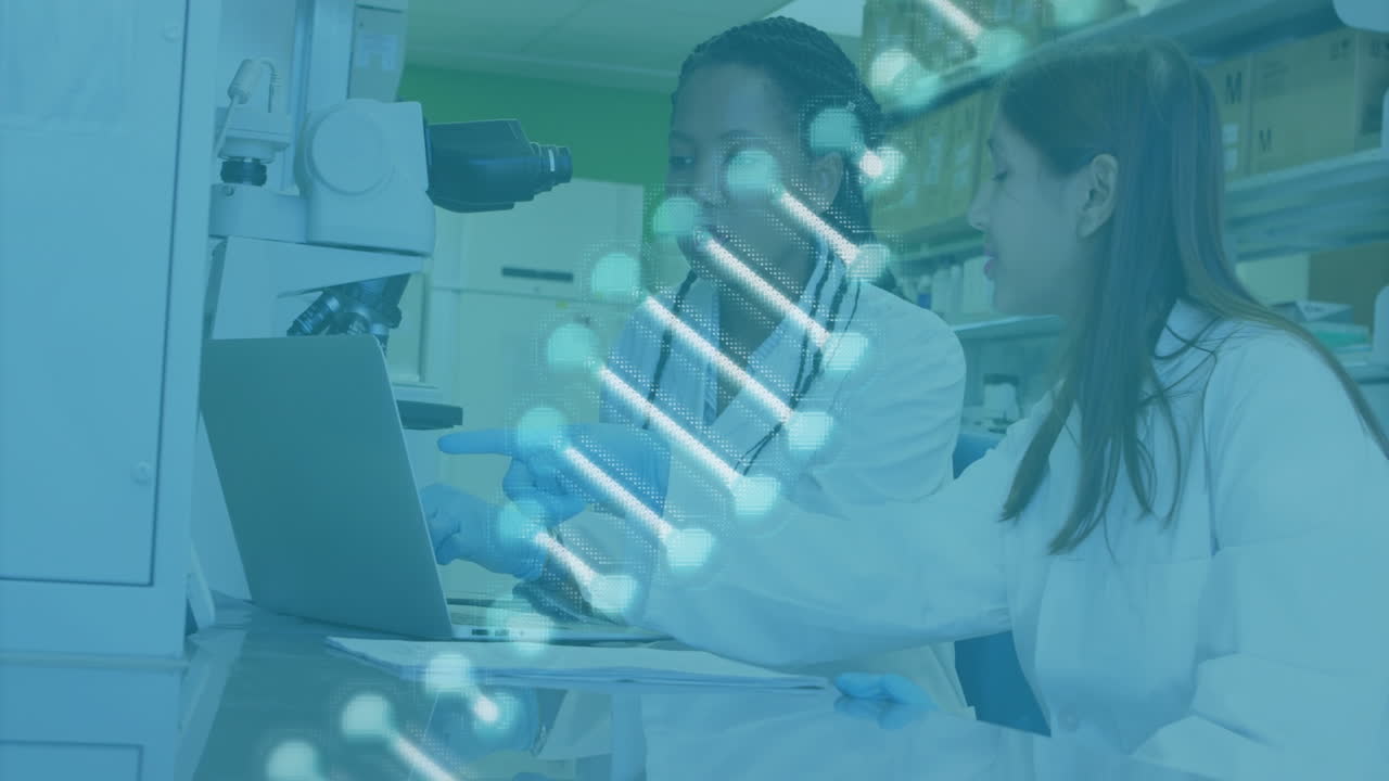 DNA strand animation over scientists working with laptop and microscope in lab