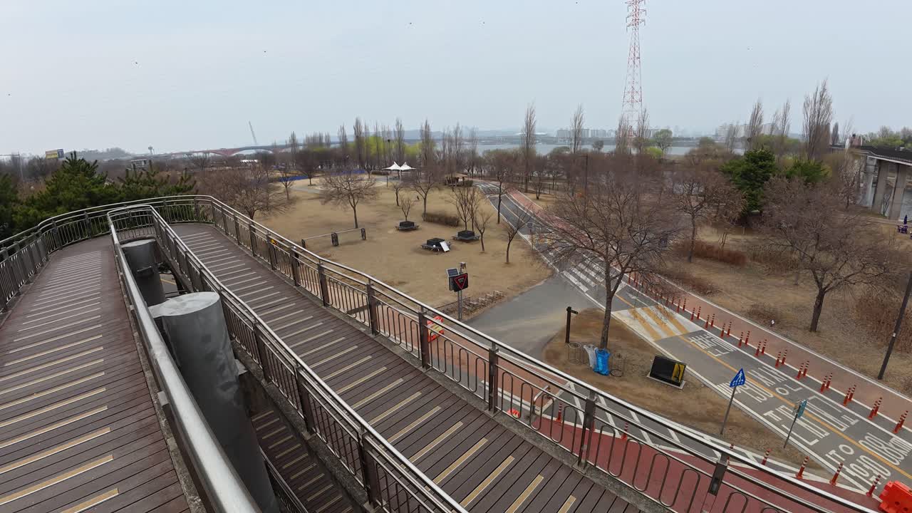 Walking On A Bridge In Yanghwa Hangang Riverside Park In Seoul, South Korea - POV