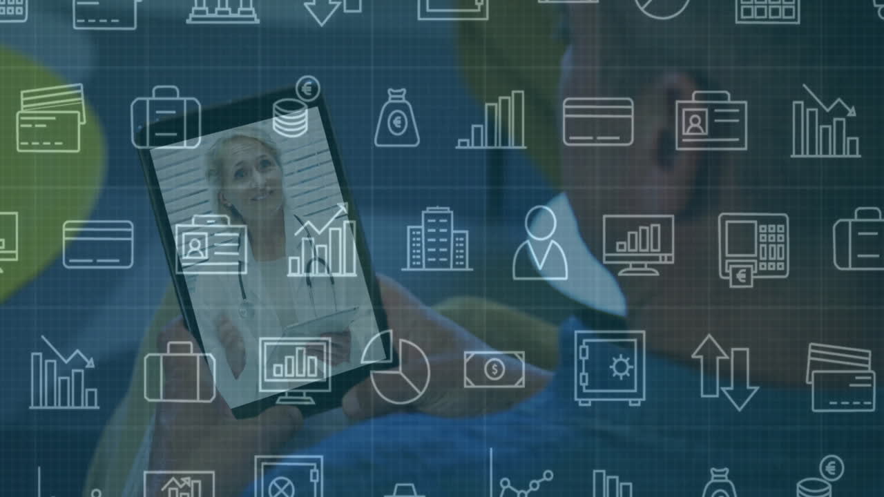 Mature man holding tablet in home office, showing telemedicine doctor avatar with financial icons