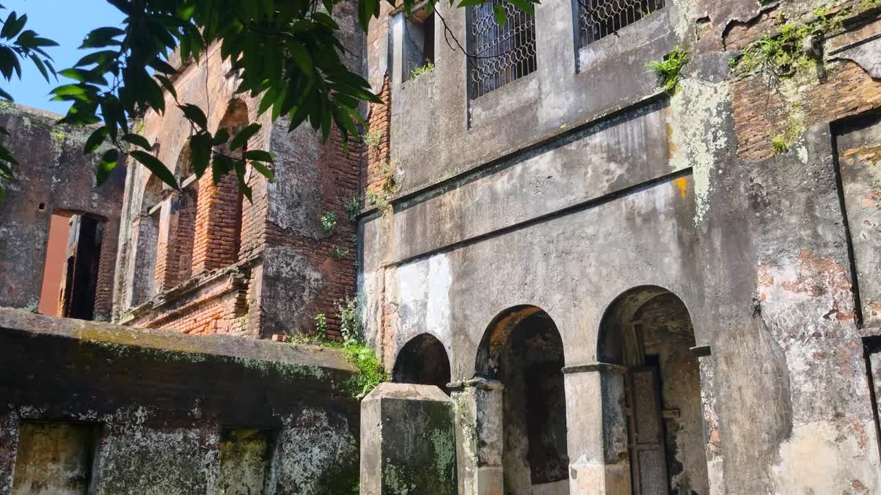Ruins of former colonial mansions in Panam Nagar, Bangladesh, standing under bright sunlight, reflecting faded elegance and the passage of time
