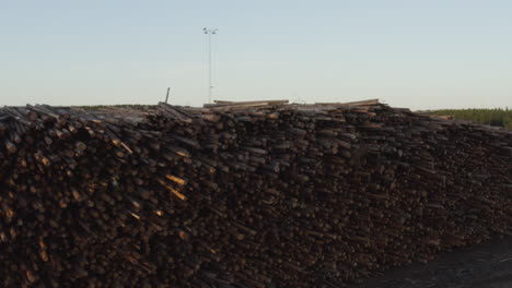 4k drone shot of swedish timber material ready for transportation and export