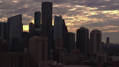 establishing shot of downtown houston, texas at sunset