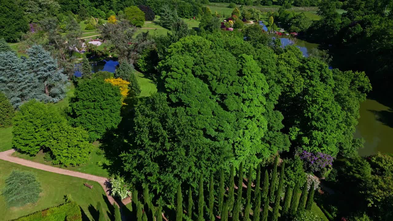 Parc de Haute Bretagne botanical garden in France. Aerial drone forward